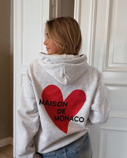 Le sweat à capuche Amore