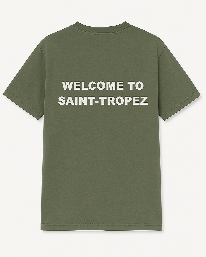 Green t-shirt with 'Welcome to Saint-Tropez' text on the back against a white background