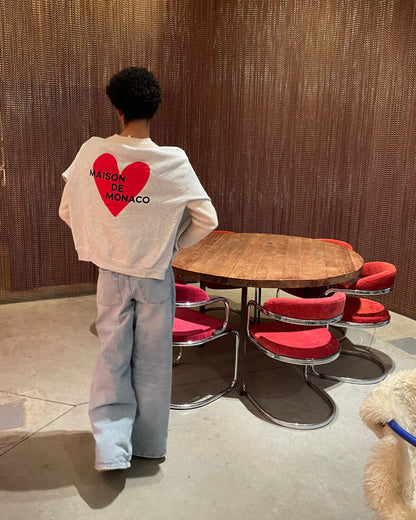 Le sweat à capuche Amore