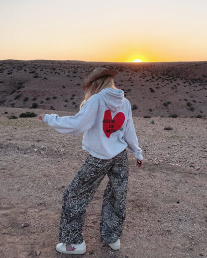 Le sweat à capuche Amore
